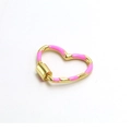 Macro view of a gold heart-shaped screw clasp with pink enamel for DIY jewelry - Pink Heart