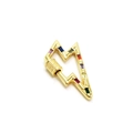 Macro shot of gold-plated lightning bolt connector with colorful rectangle zircons - Lightning Bolt / Gold