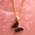 Macro shot of dark purple crystal butterfly pendant with small diamonds on gold chain - 2# Deep Purple