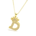 Close-up of gold crown letter D pendant necklace with sparkling cubic zirconia pavé - Gold - Letter D
