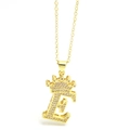 Close-up of golden crown initial E necklace with micro-paved sparkling cubic zirconia - Gold - Letter E