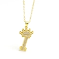 Macro shot of gold pendant featuring crown letter I encrusted with sparkling cubic zirconia - Gold - Letter I