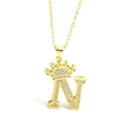 Macro view of gold crown letter N pendant featuring micro-set sparkling zircons - Gold - Letter N