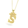 Macro shot of gold-plated crown initial S pendant with sparkling zircon micro-paving - Gold - Letter S