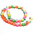 Macro view of colorful fruit polymer clay spacer beads for DIY jewelry bracelet making - 40Pcs Pack / Fruit Slices Style (5)