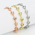 Detailansicht von Schmetterlings-Armbändern in Roségold, Gelbgold und Silber-Finish - Schmetterling Design / 18cm / Gold