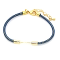 Detail of navy blue braided cord bracelet with adjustable gold lobster clasp and chain - Light Blue (Lobster Clasp)