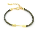 Detail of grey braided cord bracelet with gold lobster clasp and adjustable metal chain - Light Green (Lobster Clasp)