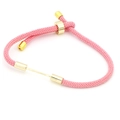 Macro shot of pink nylon braided bracelet with adjustable gold slider buckle and metal bar - Light Pink (Sliding Knot Adjustable)