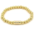 Detailed macro view of 18k gold-plated beads and Are Loved engraved capsule charm - White