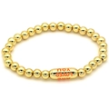 Detail of 18k gold plated beaded bracelet featuring YOU ARE LOVED engraved tube charm - Orange
