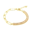Dettaglio della catena dorata a graffetta e bracciale con zirconi rettangolari color champagne - Stile Giuntato Zirconia Champagne Graffetta (10#)