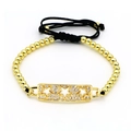 Pulsera de cuentas doradas con colgante rectangular de estrellas y cordón trenzado negro ajustable - Estilo Alineación Tres Estrellas (S5)
