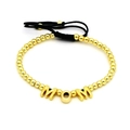 Detail of adjustable black cord bracelet featuring gold MOM letters and round beads - Gold MOM Letter Bracelet