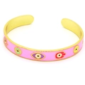 Detail of pink enamel C-shaped bangle with colorful evil eye and Hamsa Hand charms - Pink