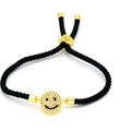Close-up of woven bracelet with gold-plated zircon smiley face pendant and slide clasp - Black Braided Smiley (A3)