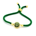 Detail of adjustable green braided rope bracelet with a gold smile face charm and zircon - Emerald Green Braided Smiley (A1)