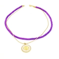 Detail of layered purple bead and gold bead necklace with a religious relief pendant - Double Layer Purple Bead Virgin Mary Style (218)