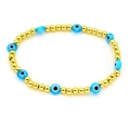 Dettaglio del bracciale con perline dorate e ciondoli blu turchi dell'occhio del male - Stile Celeste (6#)