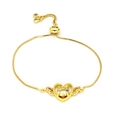 Detail of adjustable gold bracelet featuring a heart-shaped pendant with cubic zirconia - White