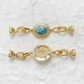Detail van 18k vergulde zonnevanger sluiting met turkoois voor sieraden maken - Zonnestralen Stijl / 18K Goud Turquoise Stijl