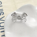 Detailed view of silver bow-shaped ring setting with micro-pave zircons for DIY jewelry - White Gold