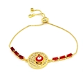 Detail of gold evil eye bracelet with red rectangular stones and adjustable slide clasp - Round Red Eye Red Stone Style (B2)