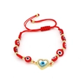 Handmade red braided cord bracelet with heart-shaped evil eye pendant and gold beads - Heart Eye Pendant Style (O3)