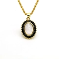 Gold Virgin Mary oval pendant necklace with white shell and black zircon accents - Black