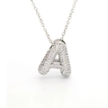 Macro shot of silver letter A pendant with pave-set sparkling crystals on a fine chain - Letter A