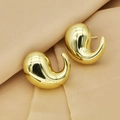 Close-up of golden teardrop earrings on elegant pink silk fabric background - Gold Dimensional Arc Water Drop Style / Gold