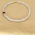 Elegant natural agate beaded necklace with white translucent stones and a red accent bead - White