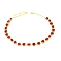 Elegant gold necklace with alternating round and square red emerald cut zircons on white background - Red