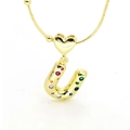 Detailed macro view of gold-plated heart clasp and multi-colored zircon letter U pendant - Letter U Style
