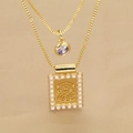 Détail du collier double doré avec gemme violette et pendentif Sagittaire orné de perles - Collier Double Rang Pendentif Relief Sagittaire (c6)