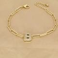 Detail of 18k gold paperclip chain bracelet featuring a zircon-encrusted letter B charm - Letter B
