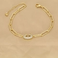 Detail of 18k gold paperclip chain bracelet with a pavé zircon letter C pendant - Letter C