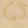 Detail of 18k gold paperclip chain bracelet with micro-paved zircon letter E pendant - Letter E