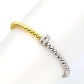 Detail of 18k gold and silver beaded bracelet with sparkling zircon letter A charm - Letter A