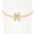 Close-up of 18k gold plated bracelet featuring a cubic zirconia paved letter H on a stand - Letter H
