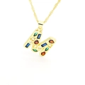 Detailed close-up of gold M letter pendant featuring colorful cubic zirconia stones - Letter M