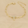 Detail of 18k gold plated paperclip chain bracelet featuring a zircon letter T charm - Letter T