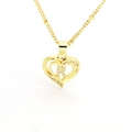 Macro detail of 18k gold heart pendant featuring a sparkling crystal letter R and twisted chain - English Letter R(R)