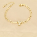 Detailed view of gold paperclip bracelet featuring a zircon-studded letter Y pendant - Letter Y