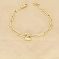Detail of 18k gold paperclip chain bracelet featuring a zircon-encrusted letter Z charm - Letter Z