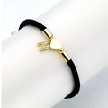 Detail of black woven cord bracelet with gold heart charm and crystal letter N pendant - Letter N
