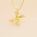 Detail of gold letter X pendant with pavé stones and a small bee on a box chain - Letter X