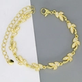 Detailed close-up of golden leaf-shaped link bracelet with white zircon and heart charm - Leaf Style (D3)