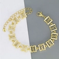 Detail of gold chain bracelet with LOVE letters, cubic zirconia pave, and heart charm - Square LOVE Style (D6)