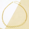 Close-up of golden clover necklace with sparkling white zircons and lobster clasp closure - Four-leaf Clover (AC89) / Gold